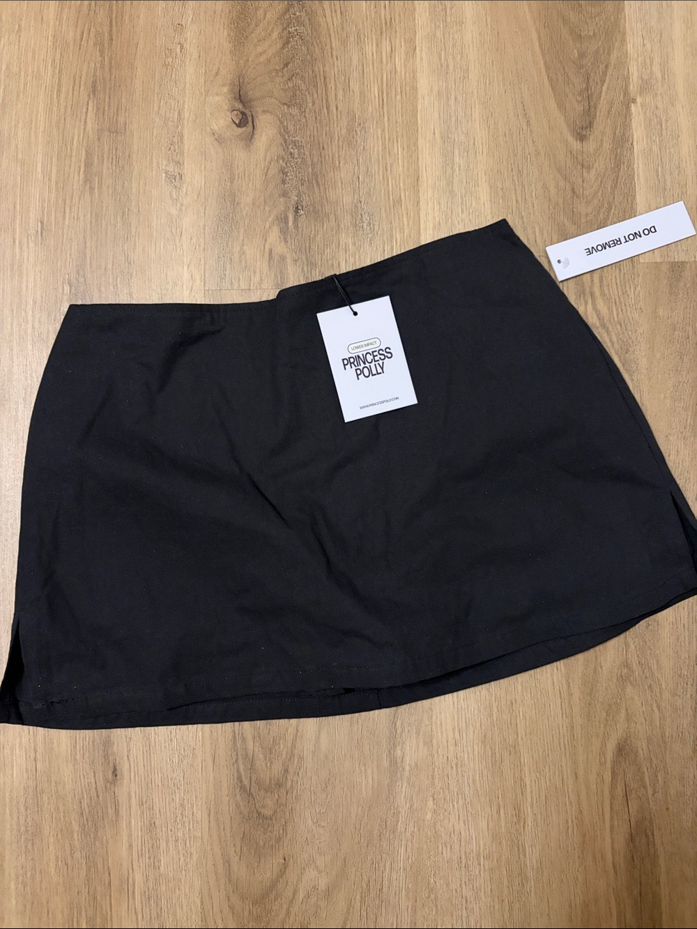 Princess Polly Black Mini Skirt with Logo Tag